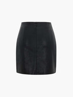 Sleek black faux leather mini skirt with pleats, fitted silhouette, and visible back zipper.