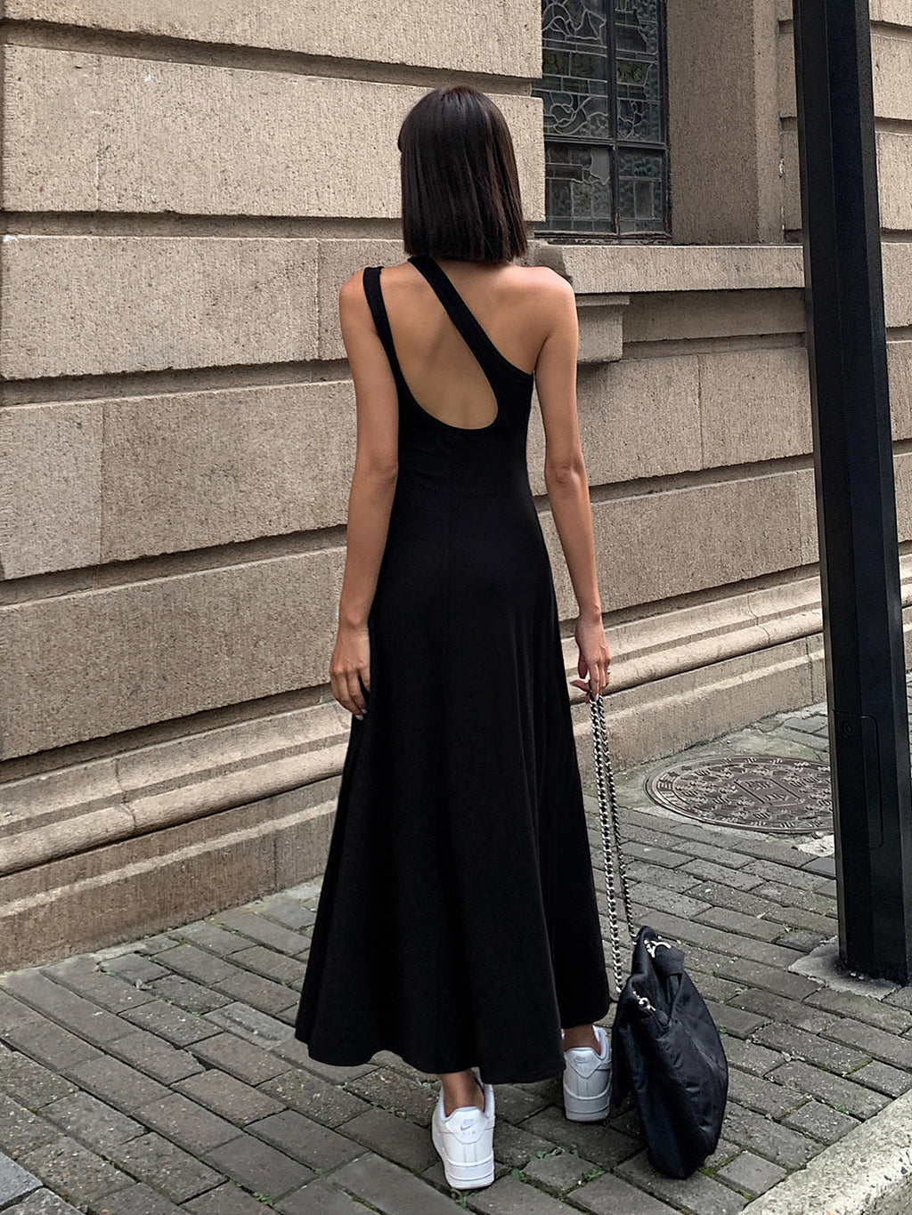 Open Back Long Sleeve Knit Dress in a solid color, featuring a fitted silhouette.