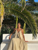 A LA FINE FLEUR Dual Layer V-Neck Long Dress with flowing fabric and elegant silhouette.