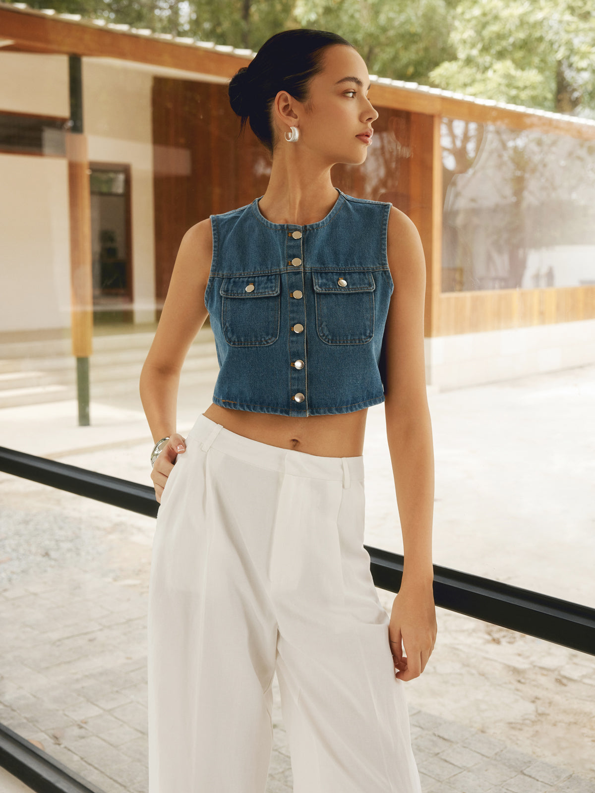 LA FINE FLEUR Double Pocket Button-Up Denim Shirt with high-waisted, wide-leg white pants.