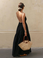 Elegant Sleeveless Long Dress with Open Back by LA FINE FLEUR in a flowing silhouette.