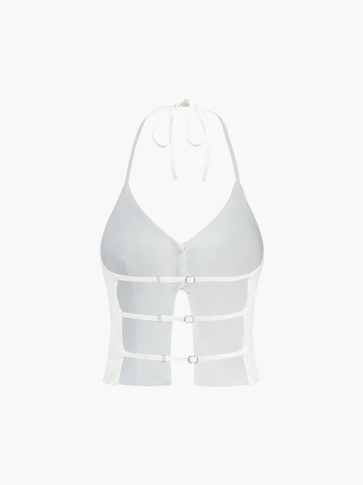 White sleeveless camisole top with three front buckles, cut-out sides, and backless design.