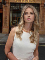 Sleeveless cotton and linen maxi dress by LA FINE FLEUR in a light shade.