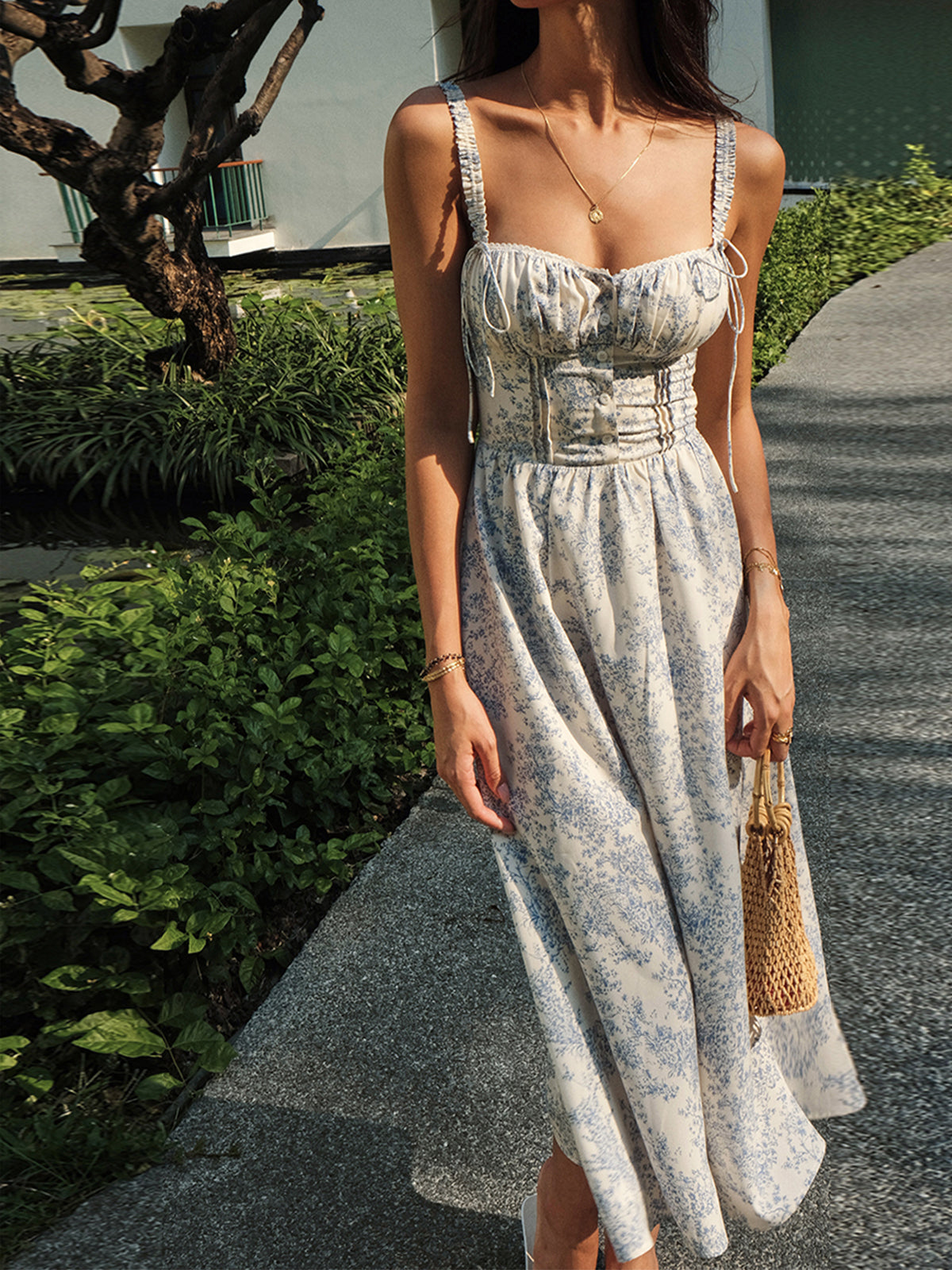 The LA FINE FLEUR Sapphire Blossom Print Camisole Midi Dress with floral detailing.