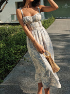 The LA FINE FLEUR Sapphire Blossom Print Camisole Midi Dress with delicate floral patterns.