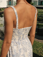 LA FINE FLEUR Sapphire Blossom Print Camisole Midi Dress with blue and white florals, smocked back.
