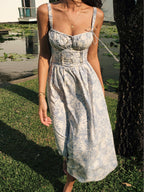 LA FINE FLEUR Sapphire Blossom Print Camisole Midi Dress featuring a vibrant blue floral pattern.