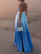 LA FINE FLEUR Backless Long Dress with cami top and side cutout details.