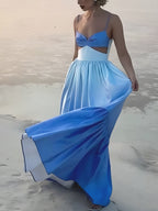 LA FINE FLEUR Backless Long Dress with Cami Top and Cutouts, featuring a flowing skirt.