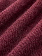 Burgundy ribbed cardigan with lace trim, tie-front bows, and softly waved, fuzzy fabric.