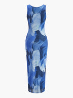 A sleeveless dress with a blue and white floral pattern on a white background.