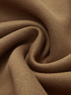 Soft brown LA FINE FLEUR cinched waist sweatshirt, showcasing smooth folds and detailed weave.