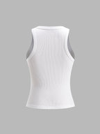 White ribbed sleeveless crop top with grey mesh trim on shoulders and hem.
