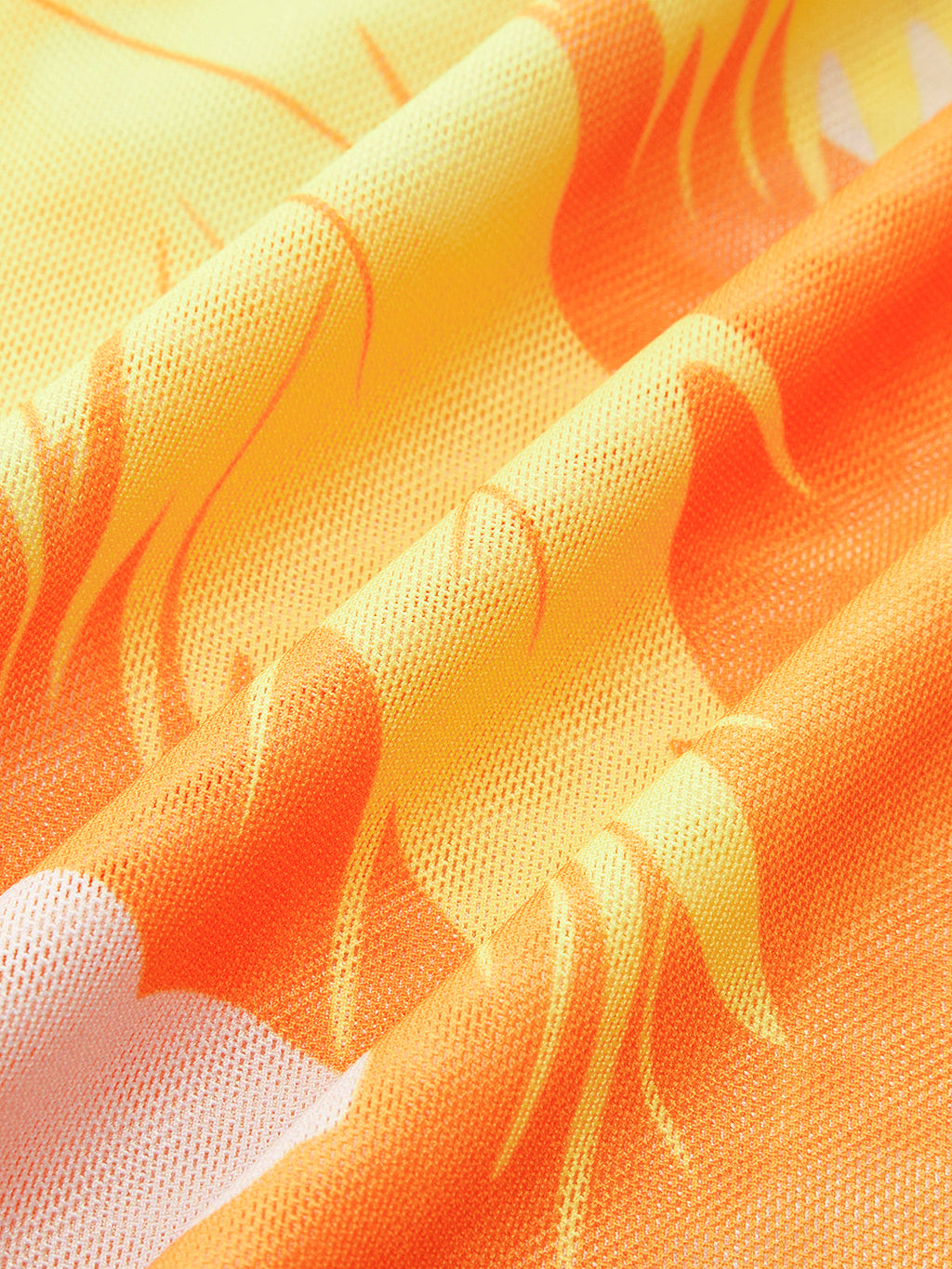 Vibrant orange and yellow mesh sarong skirt with tropical, flame-inspired floral pattern.