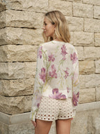 The LA FINE FLEUR Floral Wool-Blend Knit Cardigan with cozy, intricate floral patterns.