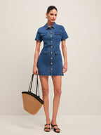 The LA FINE FLEUR Stylish Denim Dress features a button-down front and sleek silhouette.