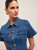 A stylish denim dress with a button-down front and gold buttons from LA FINE FLEUR.