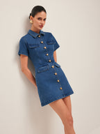 A stylish denim dress with button-down front, short sleeves, and front pockets.