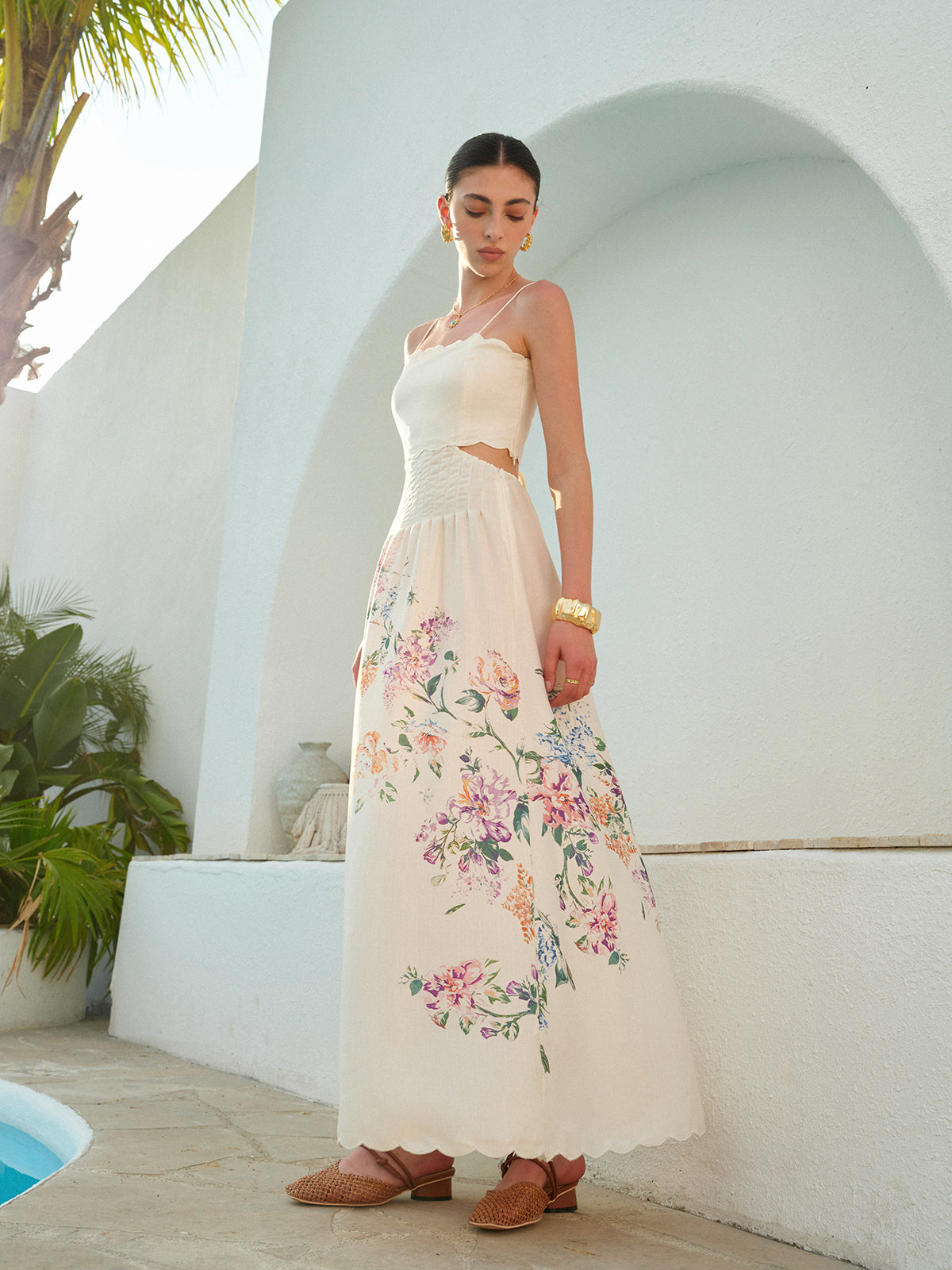 LA FINE FLEUR Floral Lace-Up Sleeveless Dress with intricate back detail and elegant lace overlay.
