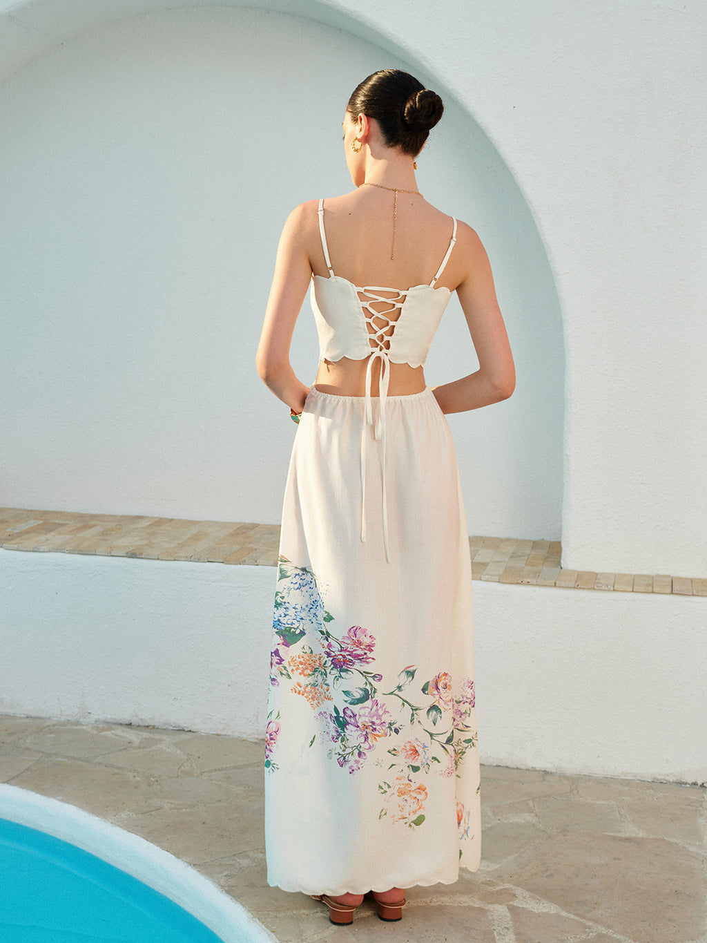 Sleeveless floral lace-up dress with intricate back detail from LA FINE FLEUR collection.