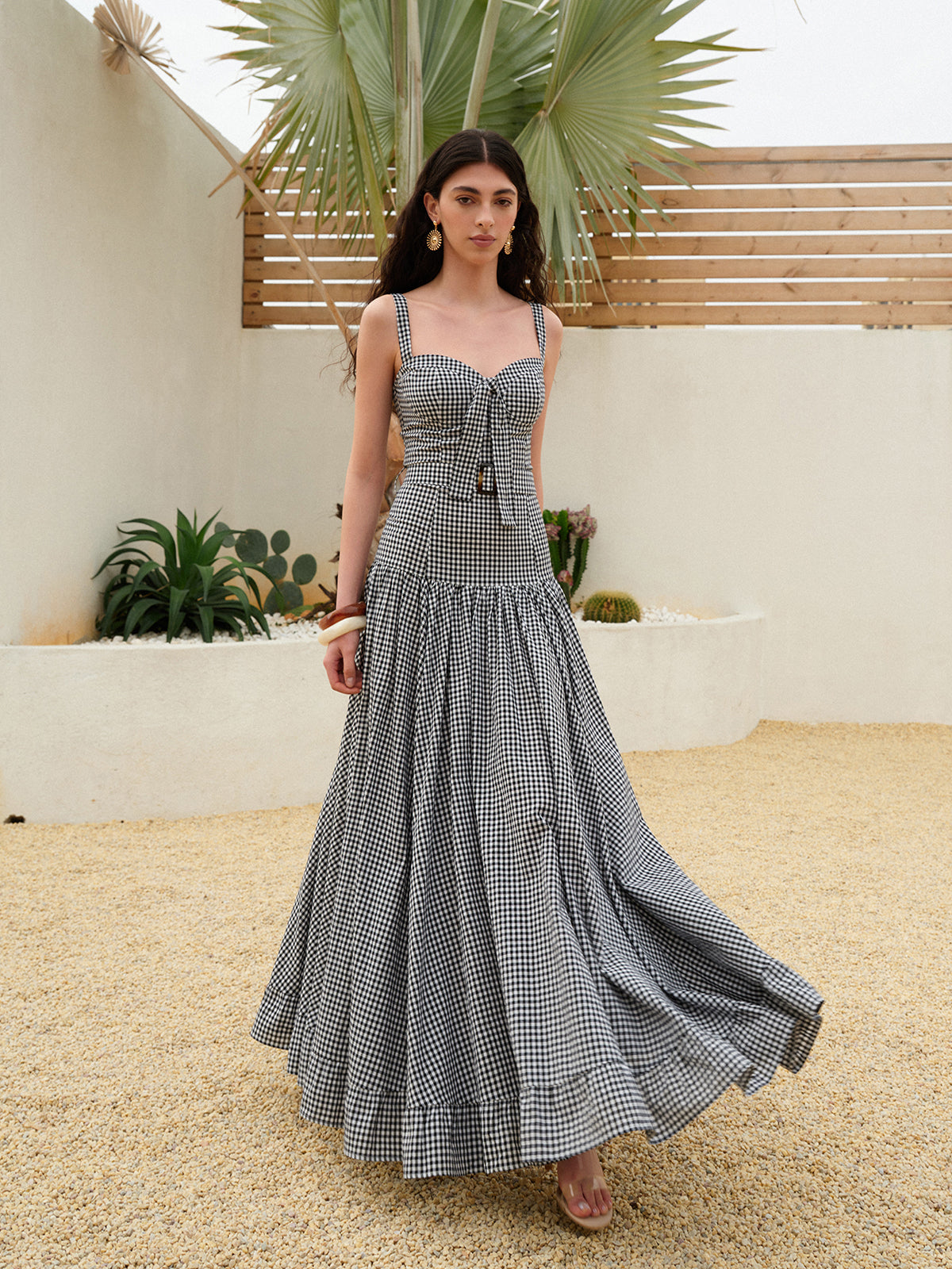 LA FINE FLEUR gingham sleeveless dress with a belted waist.