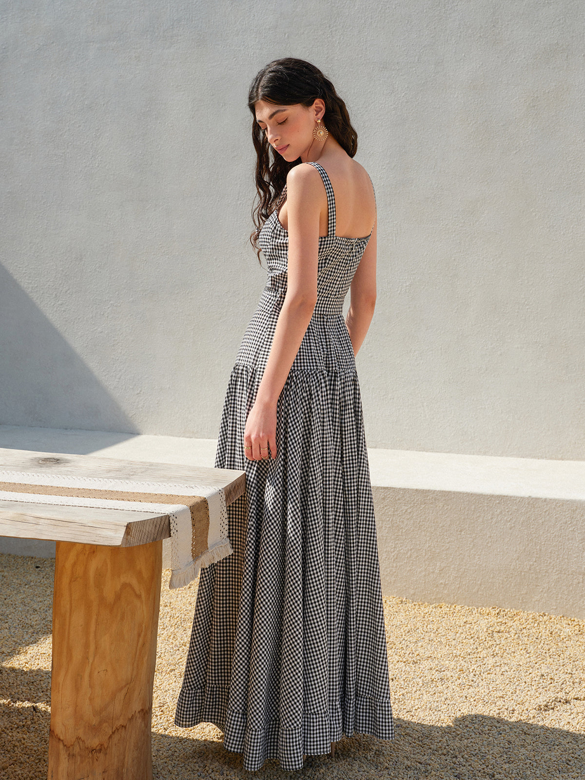 A LA FINE FLEUR gingham sleeveless dress with a belted waist, softly detailed.