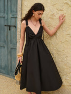 The LA FINE FLEUR Strappy A-Line Dress features a black, backless design.