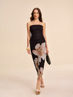 A semi-sheer strapless floral mesh dress with ruched detail by LA FINE FLEUR.