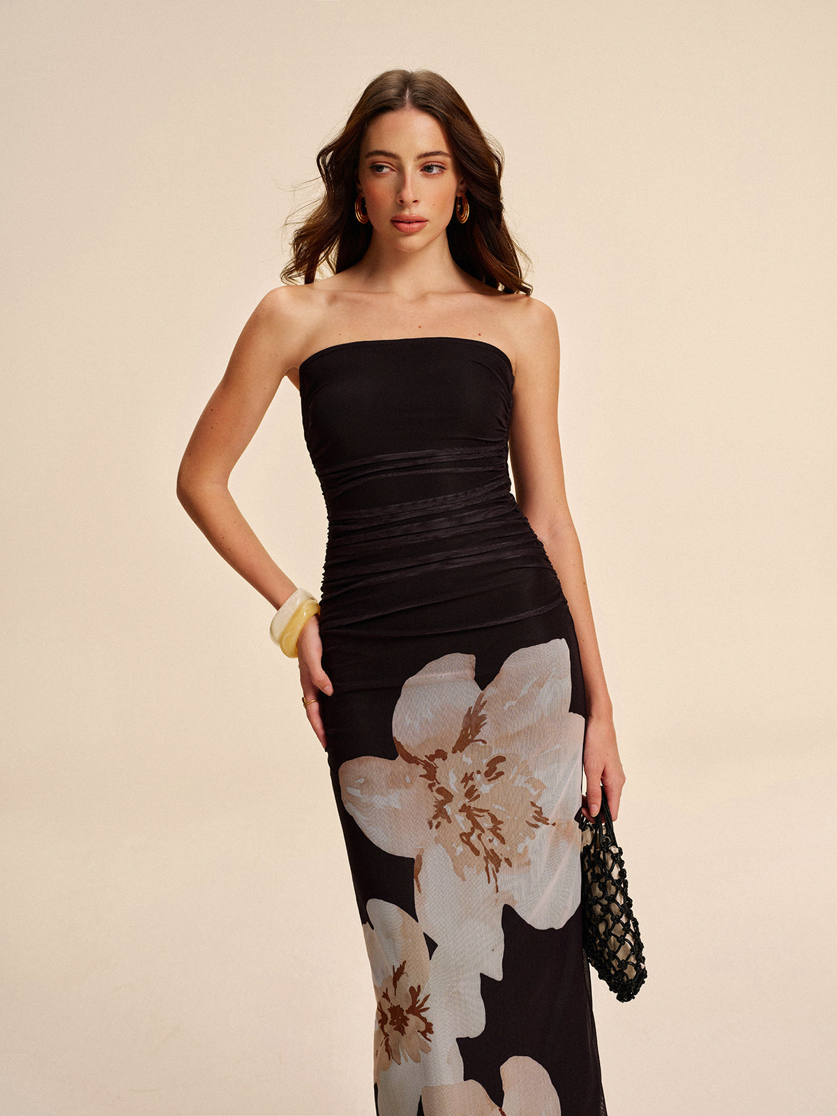 LA FINE FLEUR semi-sheer strapless floral mesh dress with ruched detail and bold beige prints.