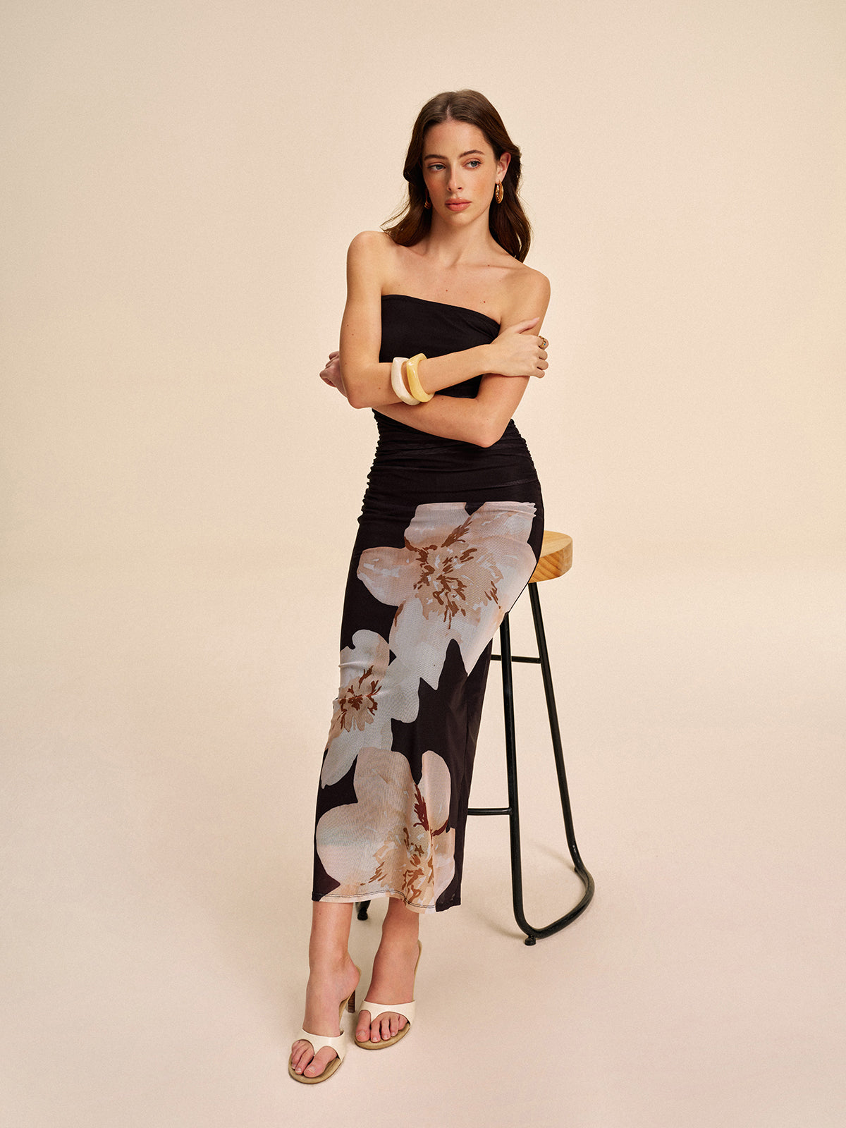 A semi-sheer strapless floral mesh dress with ruched detailing from LA FINE FLEUR.