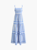 Sleeveless, blue-and-white striped maxi dress with thin straps, fitted bodice, flared skirt.