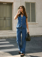 LA FINE FLEUR Denim Halter Vest with Adjustable Back Tie, paired with wide-leg jeans.