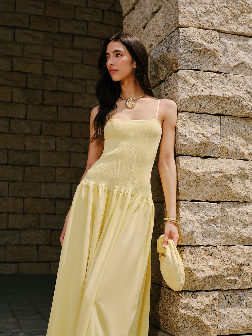 Light yellow LA FINE FLEUR cami sweater dress with pleated hem detail.
