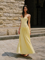 LA FINE FLEUR Cami Sweater Dress with pleated hem detail, elegant for evening wear.