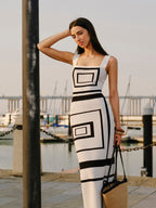 A LA FINE FLEUR square neck sweater dress featuring a geometric panel design.