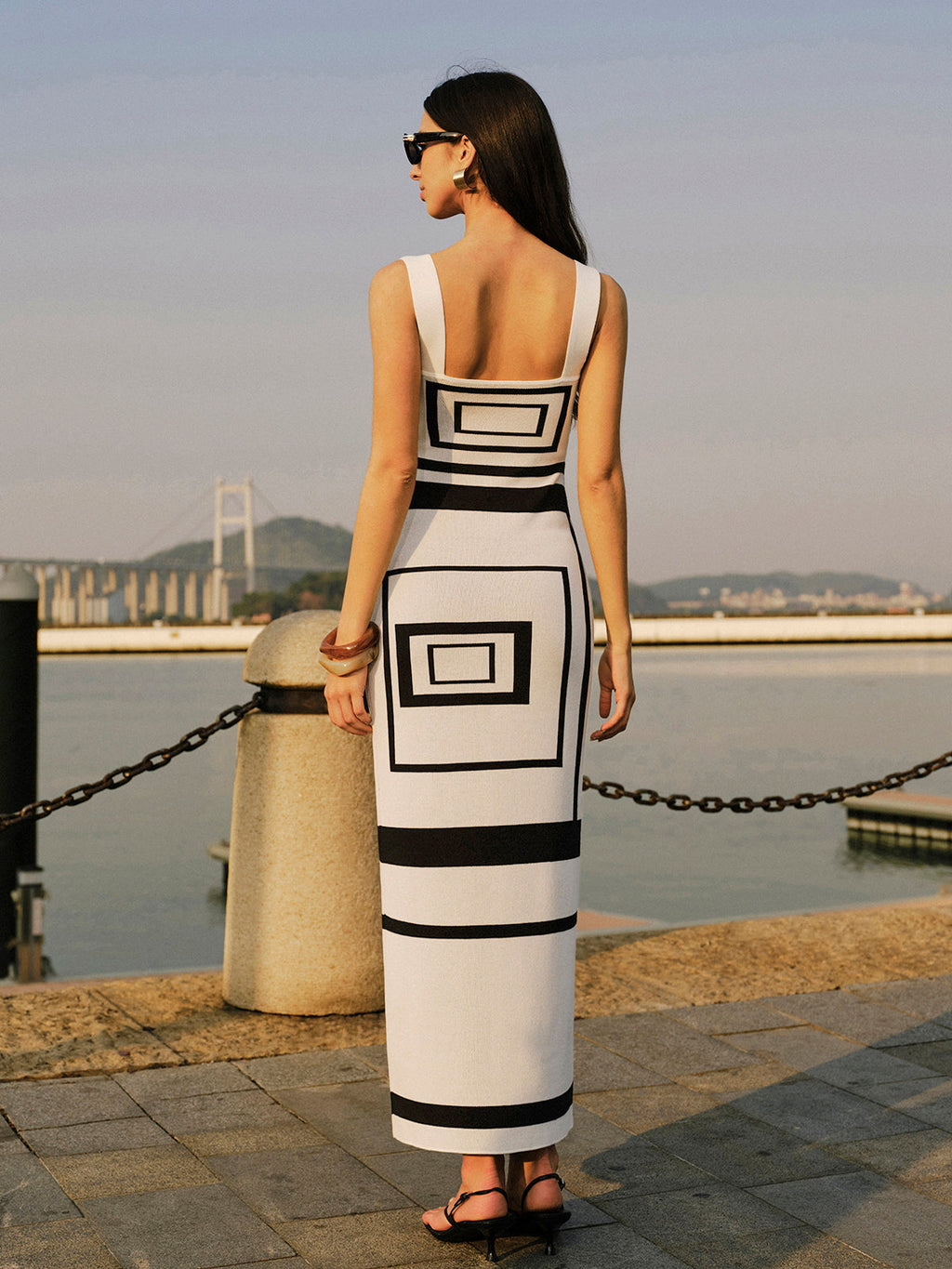 A square neck sweater dress with a geometric panel design from LA FINE FLEUR.