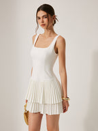 The LA FINE FLEUR Square Neckline Dress with pleated detail in a chic, elegant design.