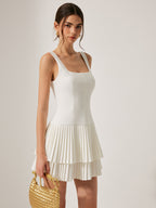 LA FINE FLEUR Square Neckline Dress with pleated detail, fitted bodice, and tiered skirt.