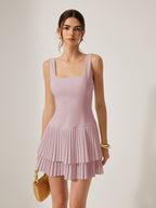 Sleeveless light purple mini dress with a square neckline and pleated detailing.