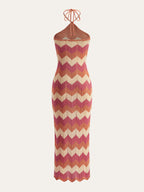 Sleeveless slim-fit chevron maxi dress in brown, pink, orange, and cream with a knotted split sweater.