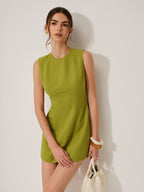 Light green cotton and linen backless dress with metal accent from LA FINE FLEUR.