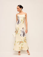 LA FINE FLEUR floral dress featuring a lace-up backless design and delicate detailing.
