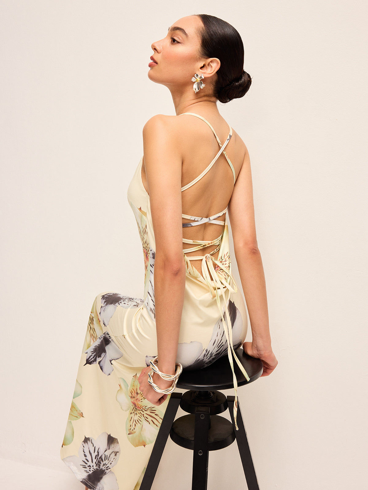 The LA FINE FLEUR Floral Dress with cream print and lace-up crisscross back straps.