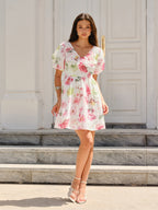 LA FINE FLEUR Puff Sleeve Dress with an elegant floral design and softly gathered sleeves.