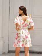 LA FINE FLEUR Puff Sleeve Dress with pink and yellow floral prints, puffed sleeves.