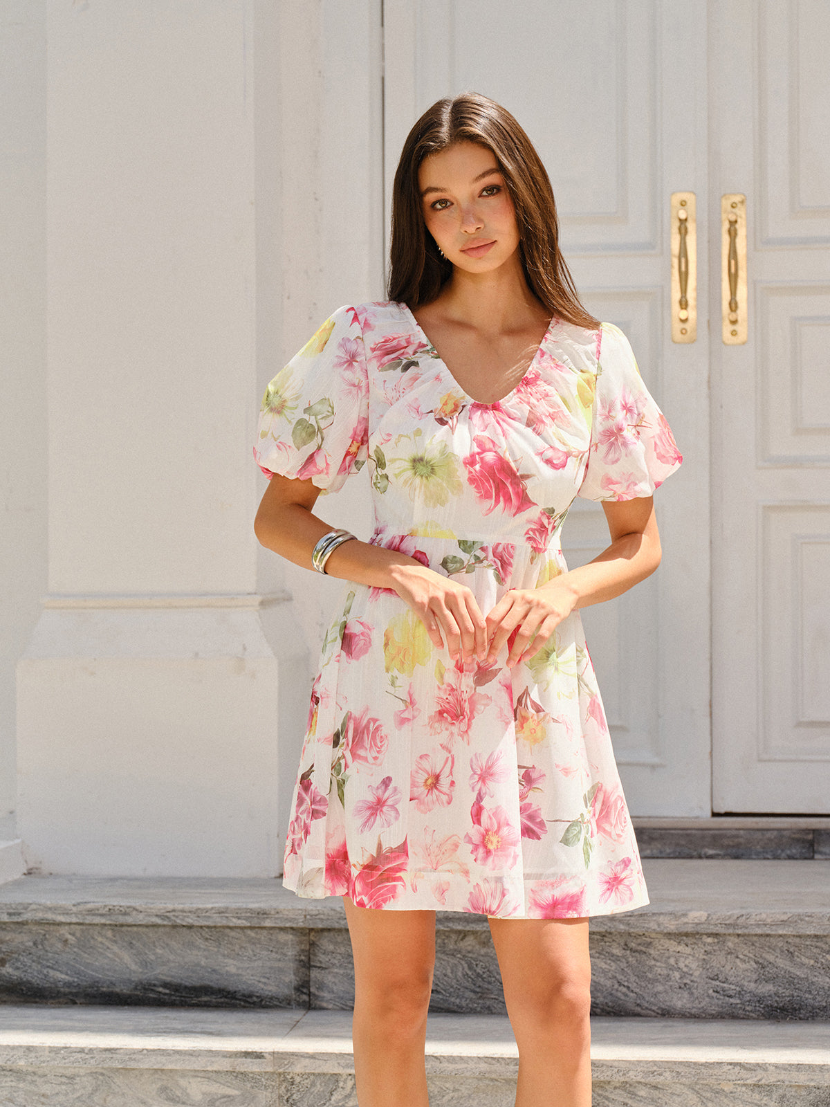 LA FINE FLEUR puff sleeve dress featuring an elegant floral design and delicate detailing.