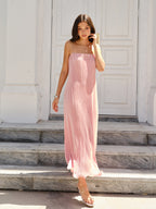 A LA FINE FLEUR spaghetti strap pleated maxi dress with a flowing, elegant silhouette.