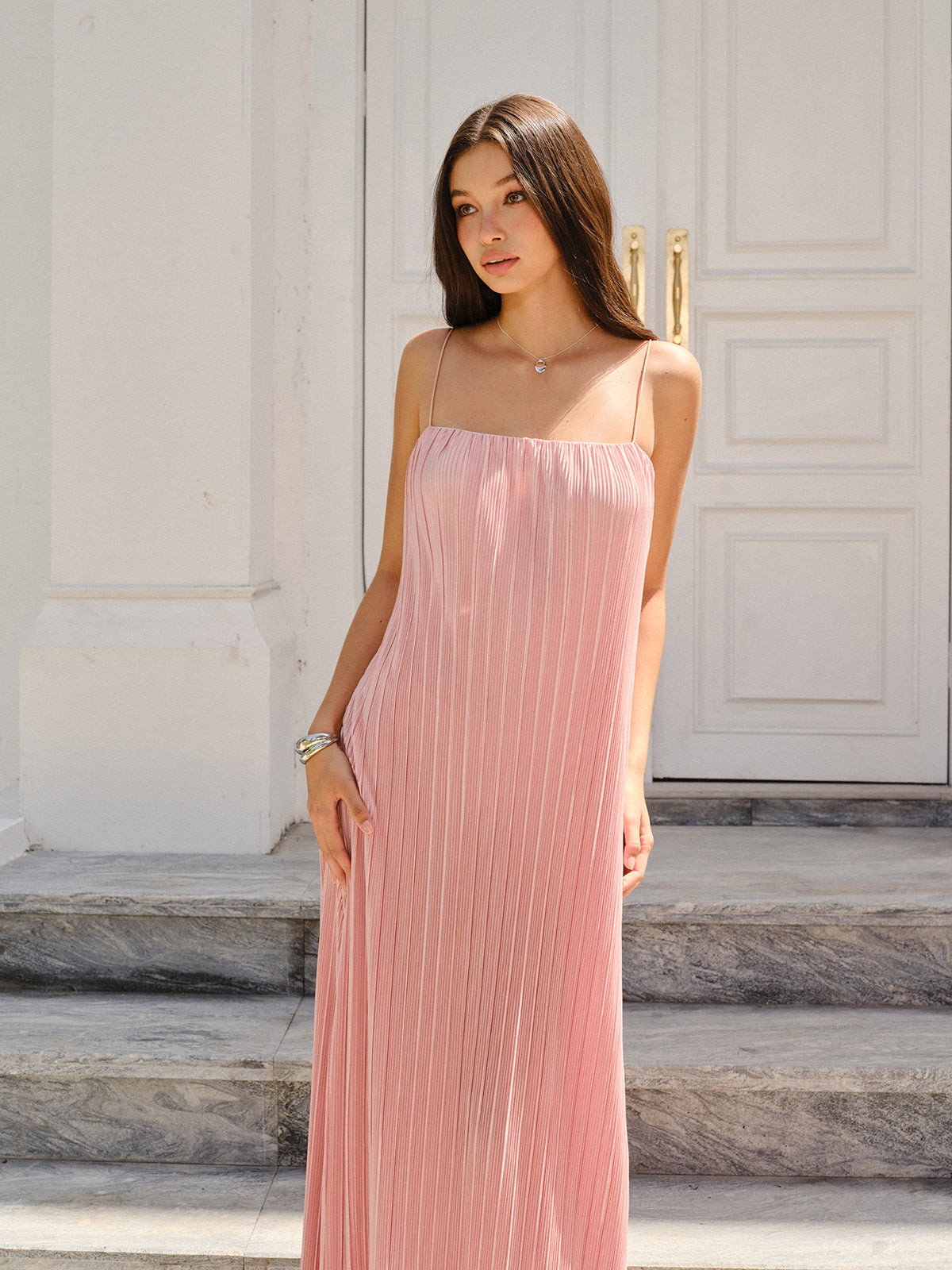 A LA FINE FLEUR Spaghetti Strap Pleated Maxi Dress in a flowing, elegant silhouette.