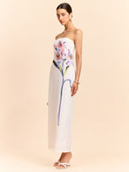 White strapless maxi dress with colorful floral design from LA FINE FLEUR.