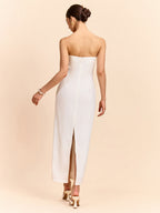 Strapless maxi dress with elegant floral design in light fabric and refined tailoring.